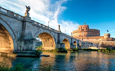 A view from the River Tiber towards the arches of the Sant Angelo Bridge in Rome, Italy